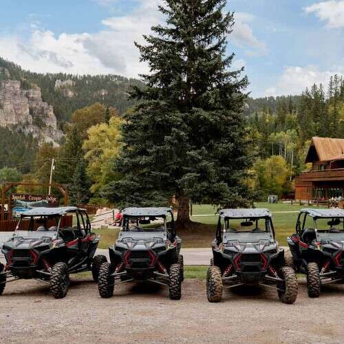 UTV rental fleet in front of Spearfish Canyon Lodge