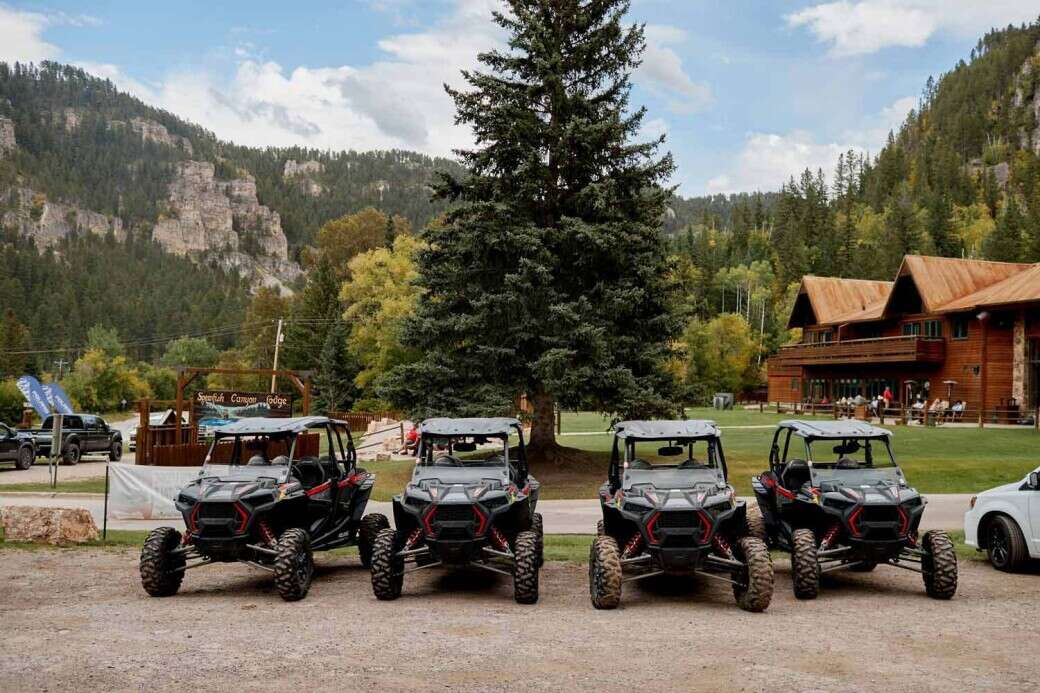 UTV rental fleet in front of Spearfish Canyon Lodge