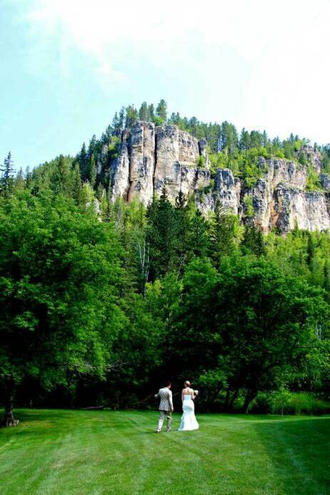 Bride & Groom with Spearfish Canyon's Limestone Cliffs in Background