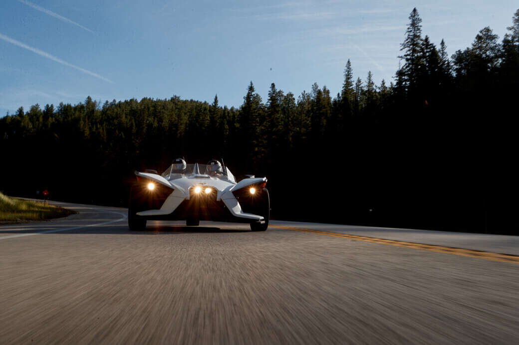 Slingshot driving through scenic Spearfish Canyon Scenic Byway 