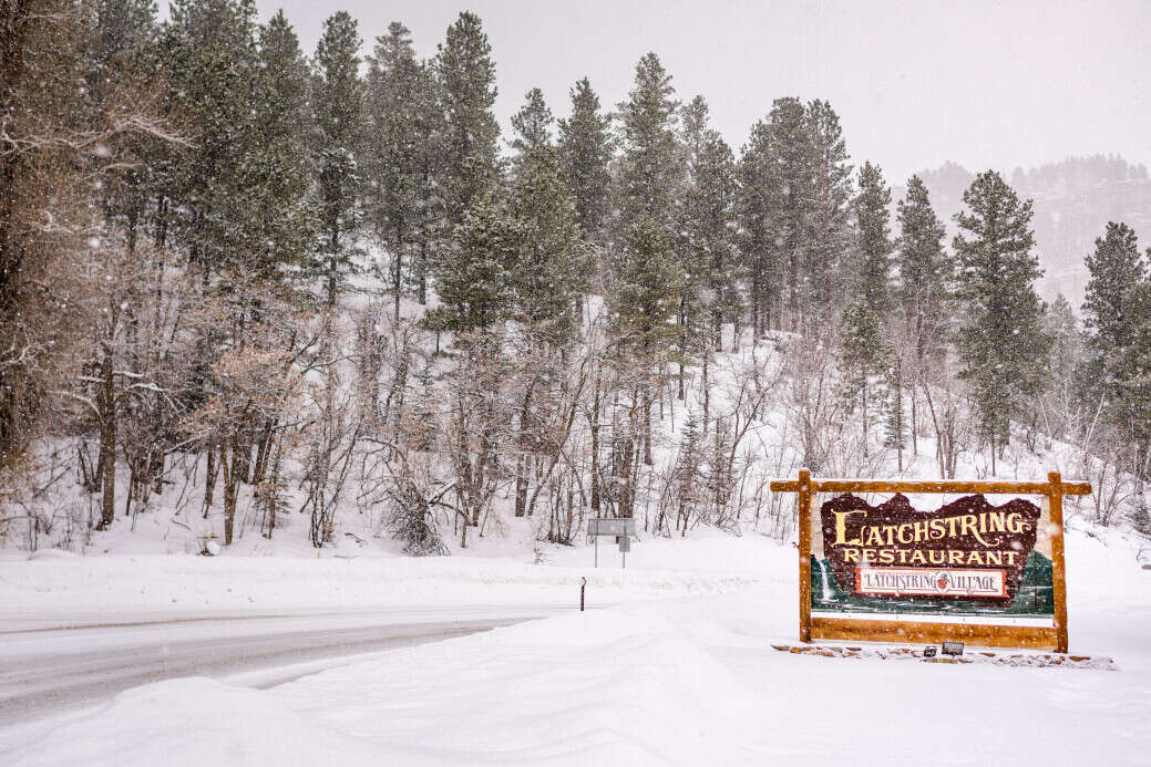 Winter View of the Latchstring Restaurant Sign 