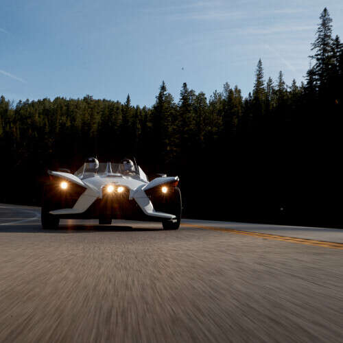 Slingshot driving through scenic Spearfish Canyon Scenic Byway 
