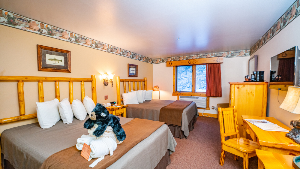 Spearfish Canyon Lodge's Premier Rooms with 2 Queen Beds and Desk Area